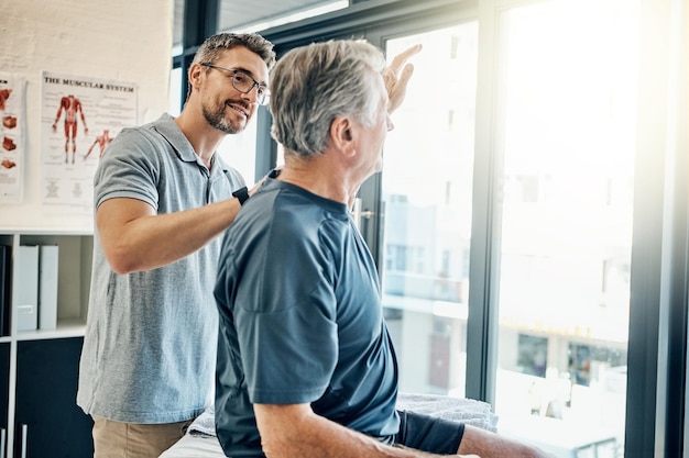 physiotherapy chiropractor senior man with pain rehabilitation consulting stretching healthcare physical therapy person with patient medical service wellness support